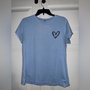 Light blue tee shirt with heart